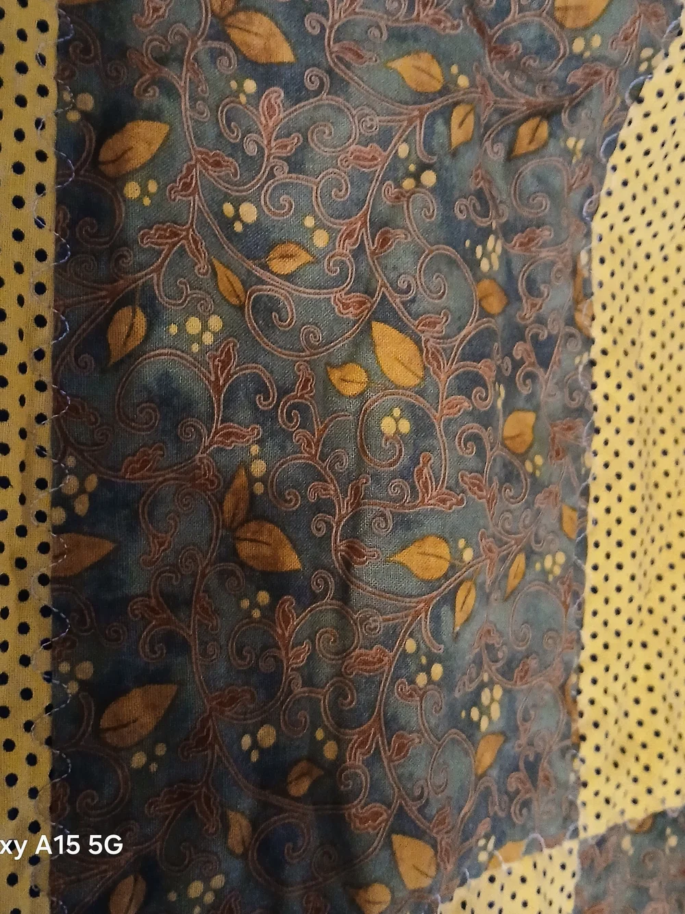 Hand Crafted Yellow and Olive Patchwork Quilt with Navy Polka Dot Border